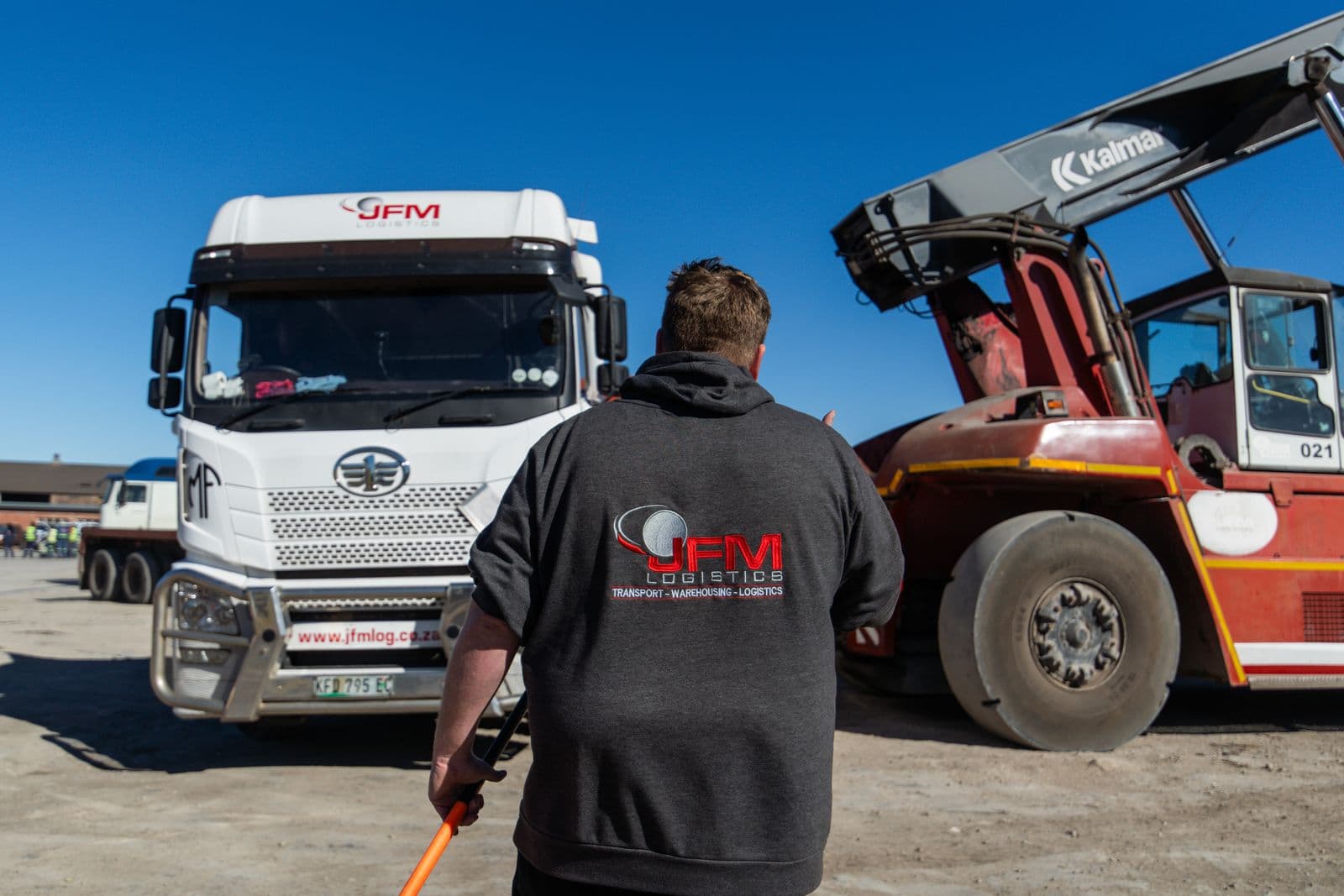 JFM crew with a FAW horse and reach stacker
