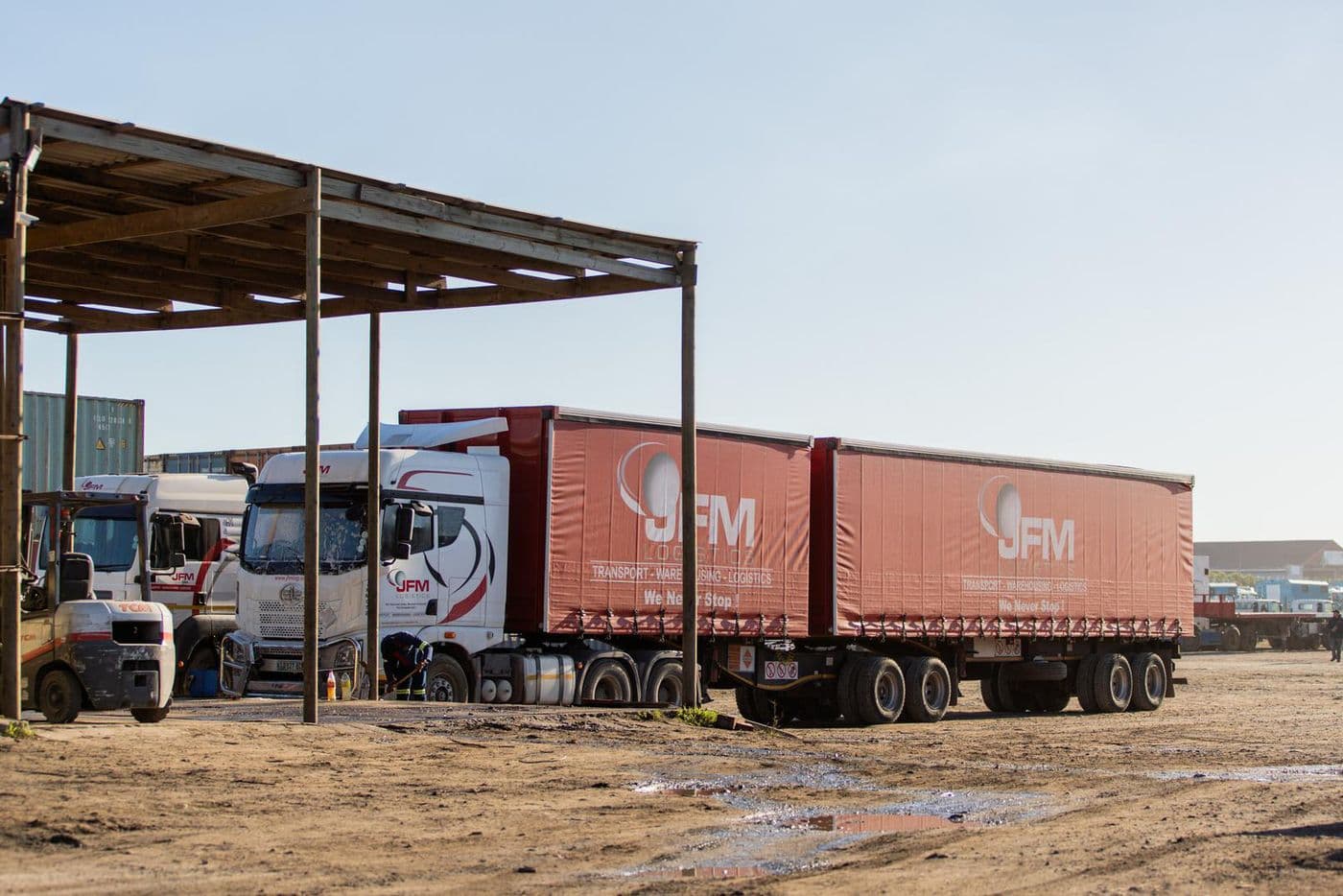 Tautliners staged under cover